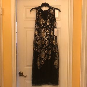 Your little black and gold dress